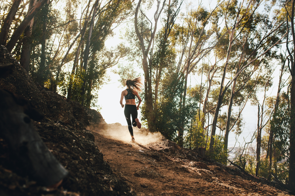 Woman running uphill