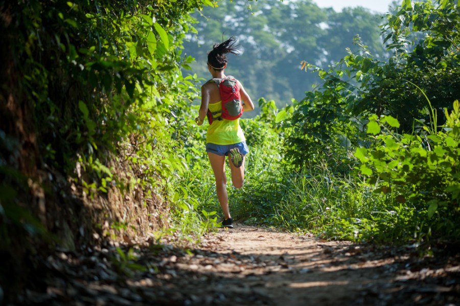 Woman running on trails