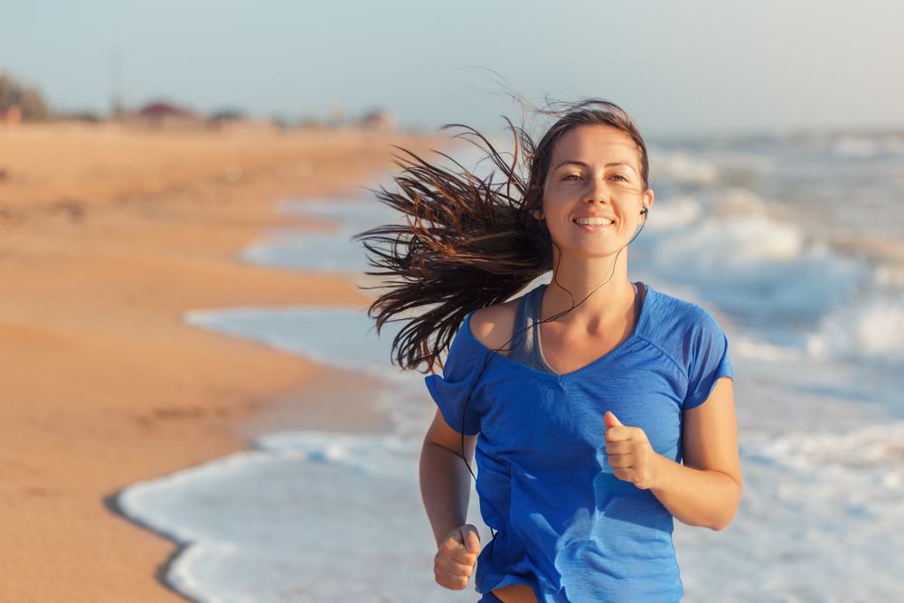 woman Running beach fitness