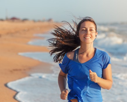 woman Running beach fitness