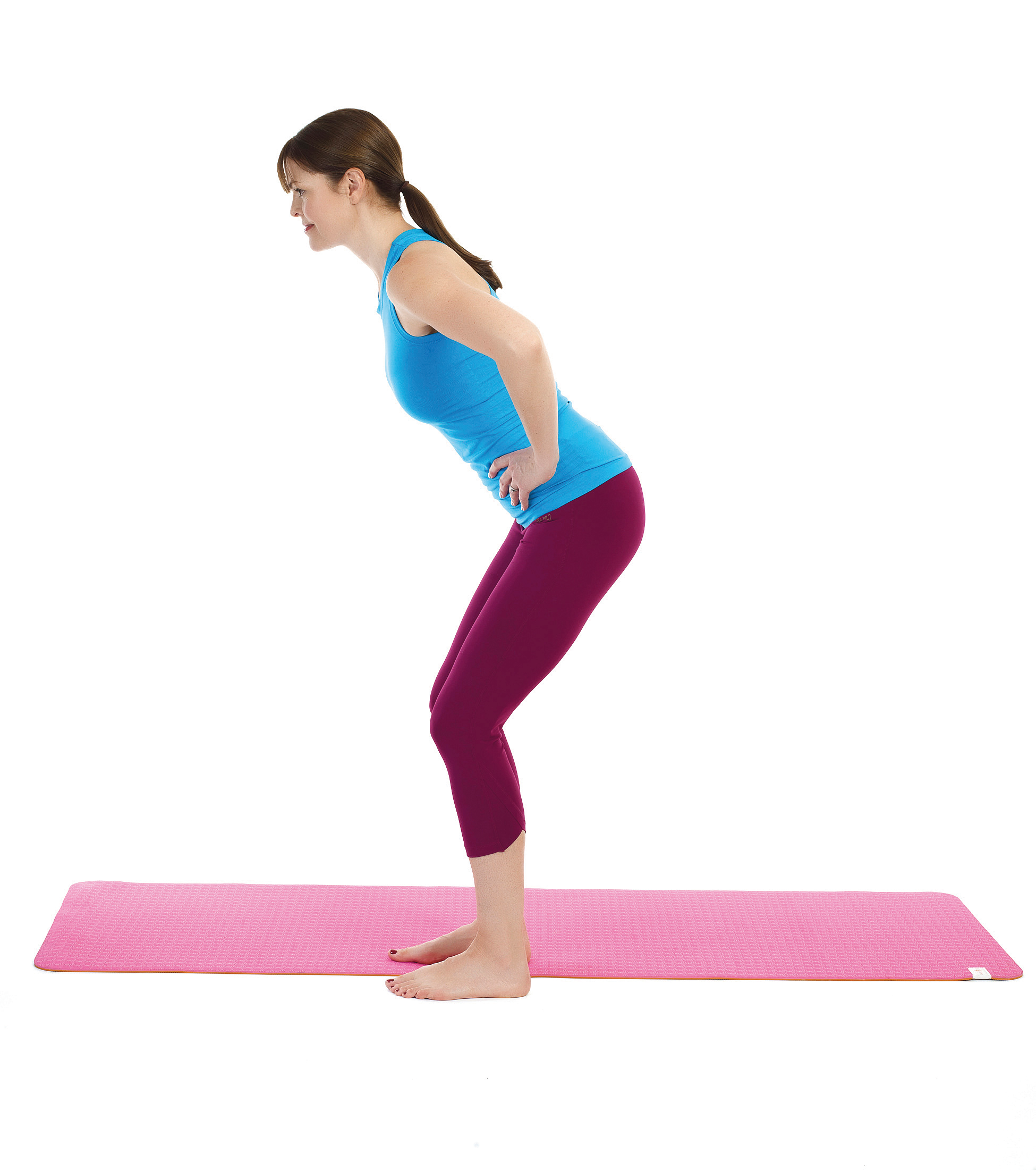 fitness woman demonstrating scooter exercise in Pilates