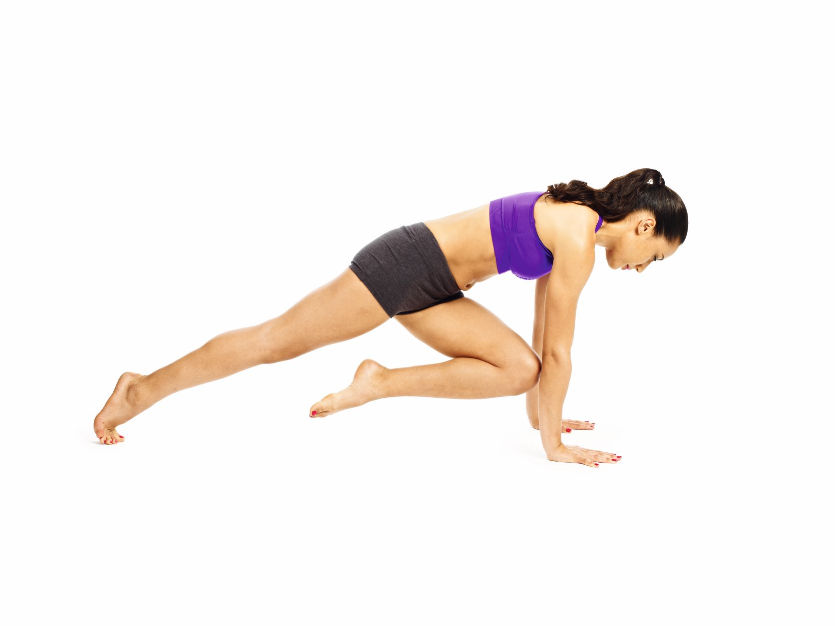 oman demonstrating twisting plank pose in fat burning yoga workout