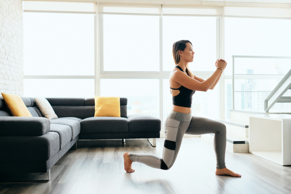 woman practicing fitness workouts at home
