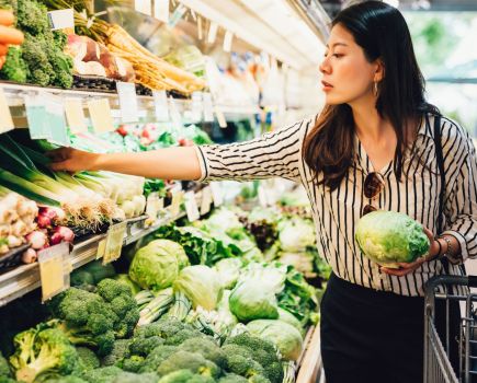 woman shopping for healthy groceries
