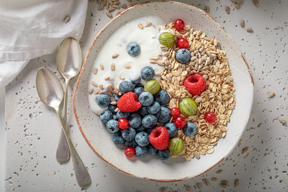 natural yoghurt with berries and seeds in bowl healthy breakfast ideas recipes