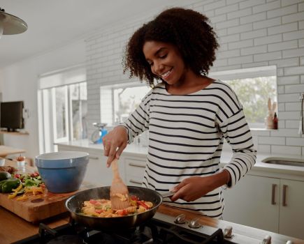 woman preparing healthy dinner recipes and ideas