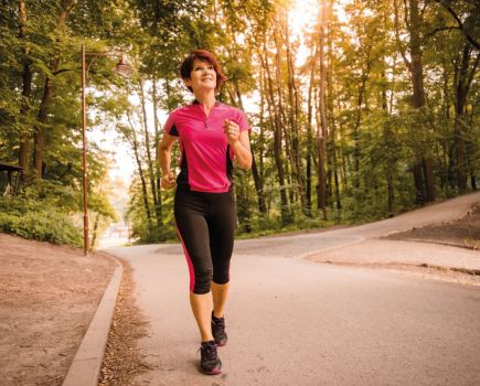 woman out for a run walk improving fitness during menopause