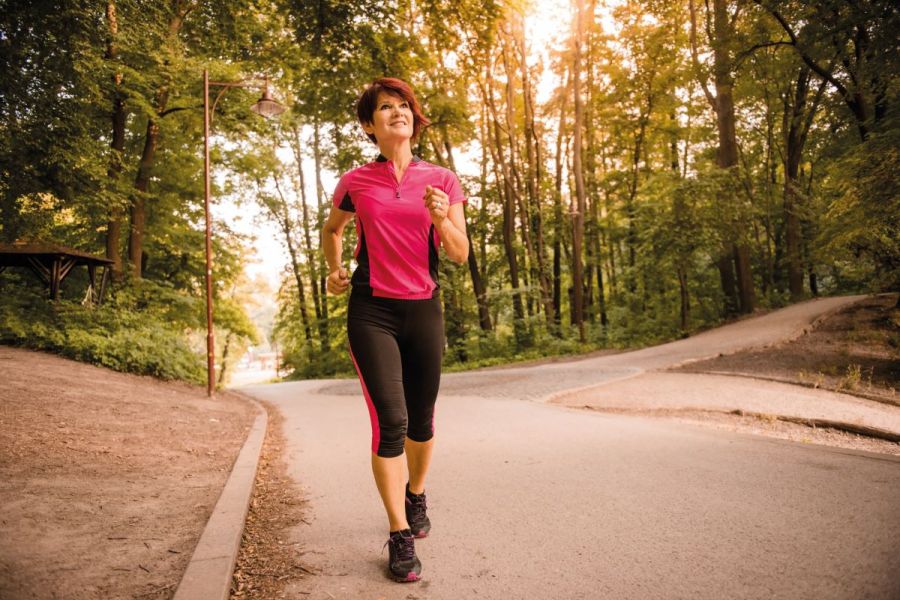 woman out for a run walk improving fitness during menopause