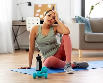 woman exercising on period