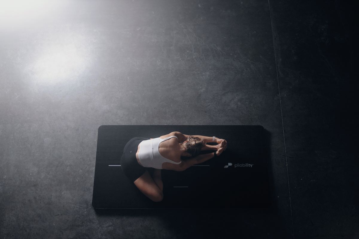 single leg seated forward fold post-workout mobility stretching routine