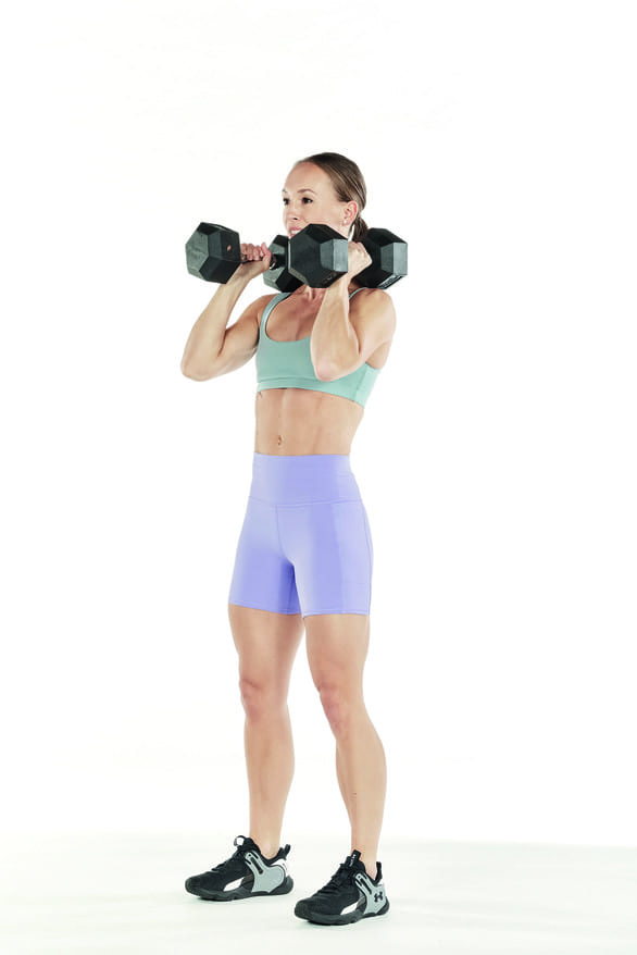 woman demonstrates squat and pulse 