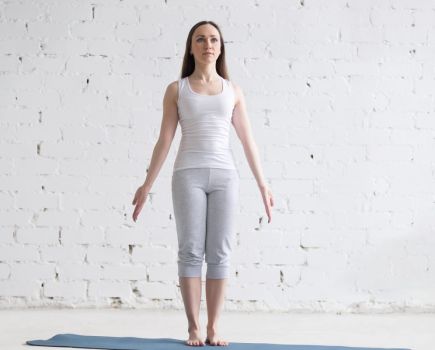woman in tadasana yoga pose alignment