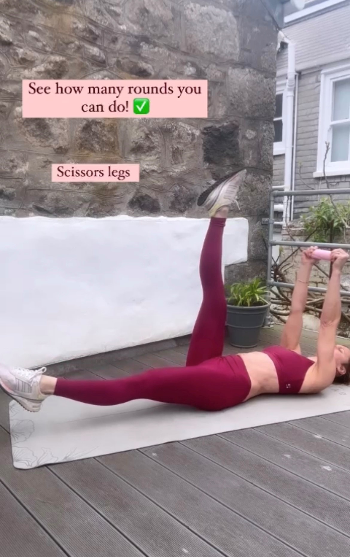 scissor legs in weighted core workout