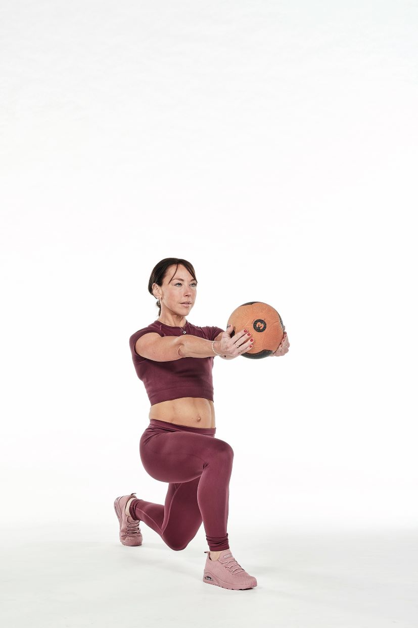 twisted lunge with medicine ball