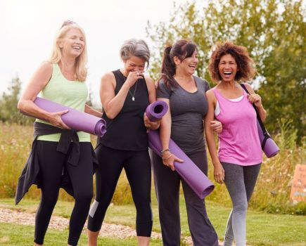 women walking to fitness class