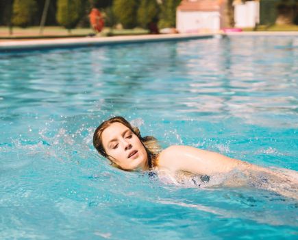 woman swimming swimmer's ear