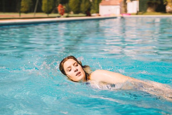 woman swimming swimmer's ear