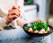 unrecognisable woman eating healthy meal, good quality food concept